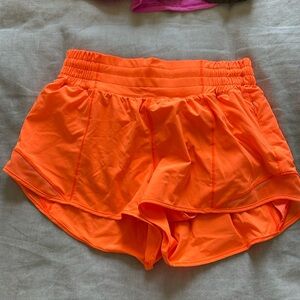 Hotty Hot Low Rise 2.5 inch Lululemon shorts highlighter orange, size 6